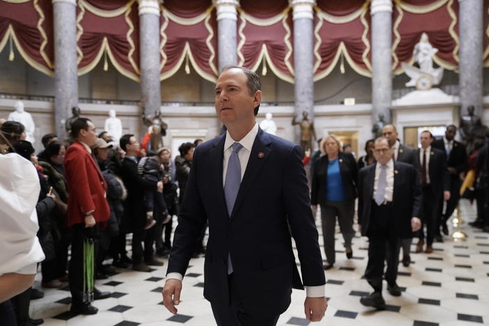 Impeachment managers, House Intelligence Committee Chairman Adam Schiff, D-Calif., front center, followed by House Judiciary Committee Chairman, Rep. Jerrold Nadler, D-N.Y., and others, walk to a press conference at the Capitol Tuesday morning.