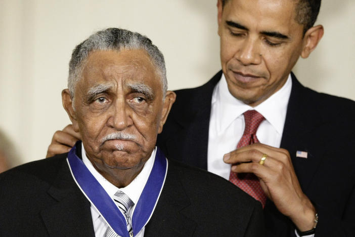  In this Aug. 12, 2009, file photo, President Barack Obama presents a 2009 Presidential Medal of Freedom to the Rev. Joseph E. Lowery n the East Room of the the White House in Washington.