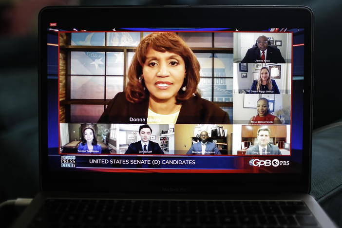 Donna Lowry, center, and Greg Bluestein, bottom right, host a virtual debate May 3 for Georgia's Democratic for Senate candidates, from bottom left, Teresa Tomlinson, Jon Ossoff, Marckeith DeJesus, Maya Dillard Smith, Sarah Riggs Amico and James Knox.