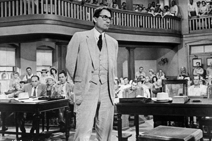  In this 1962 file photo originally released by Universal, actor Gregory Peck is shown as attorney Atticus Finch, a small-town Southern lawyer who defends a black man accused of rape, in a scene from "To Kill a Mockingbird."