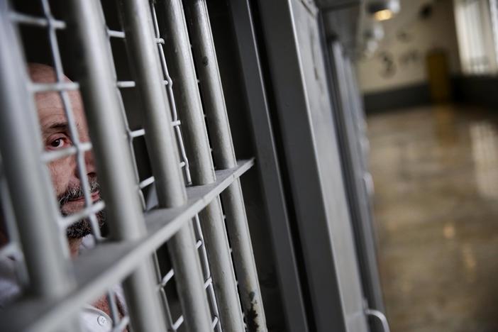 Prisoner Ricky Wheat looks out from his cell at the Georgia Diagnostic and Classification Prison, Tuesday, Dec. 1, 2015, in Jackson, Georgia.