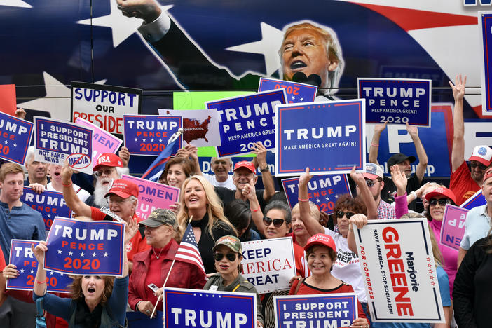 More than 100 anti-impeachment protestors showed up outside the office of Rep. Lucy McBath (D-Marietta) Tuesday. About 50 counter-protestors were also there to voice support of impeaching President Donald Trump.