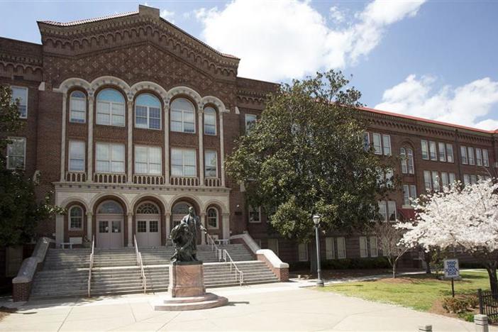 Rivers-Cannon works with students at Booker T. Washington High School (above) and Fickett Elementary School in Atlanta.