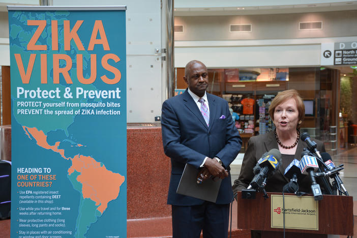 Brenda Fitzgerald discusses the Georgia Department of Public Health's collaboration with Hartsfield-Jackson as Miguel Southwell, the airport's general manager, looks on.