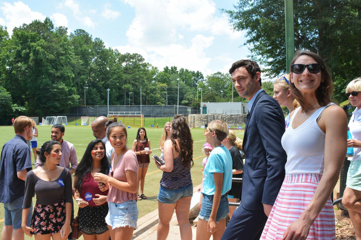 Democrat Jon Ossoff and his fiancÃ©e, Alisha Kramer, arrive at a "Rock Your Ossoff!" rally aimed at getting millennials to vote.
