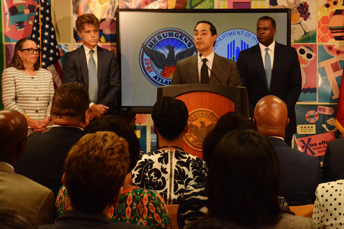 Secretary JuliÃ¡n Castro discusses the addition of five westside Atlanta neighborhoods to HUD's Promise Zone Communities program while Atlanta city officials look on Monday at M. Agnes Jones Elementary School.