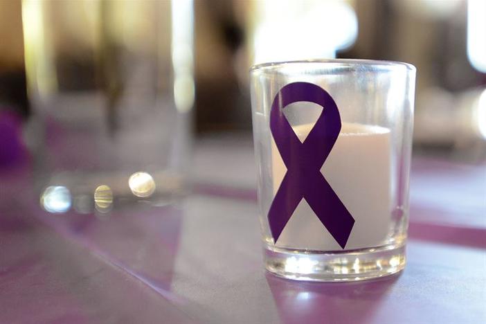 In October, the purple ribbon is worn in honor of domestic violence survivors.