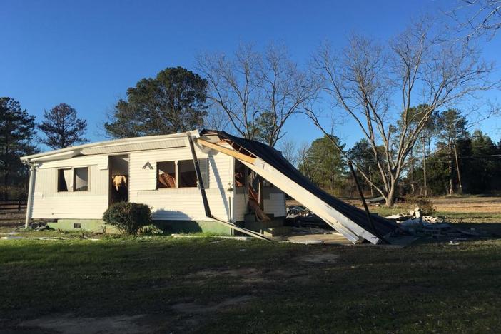 A south Bibb County home sits dismantled at the corner of Kearnes and McArrell drives where Georgia Power will begin building a 650-acre solar farm in 2020. 