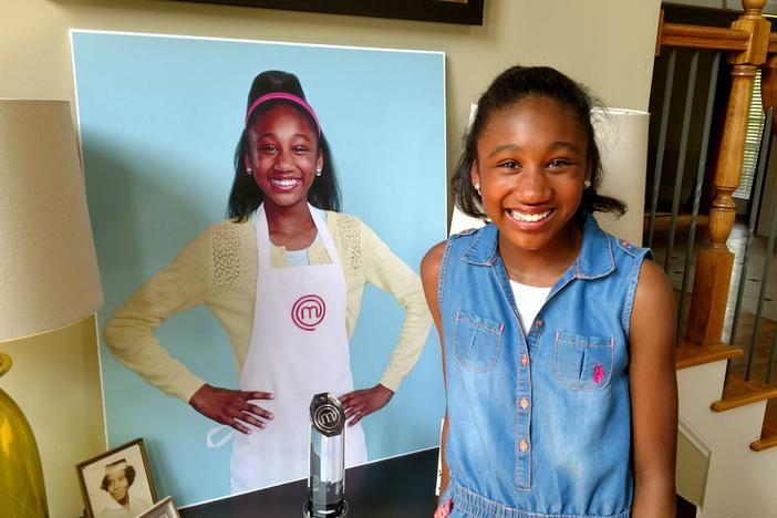 Jasmine Stewart of Milton, Georgia with the trophy she won on FOX's MasterChef Junior.
