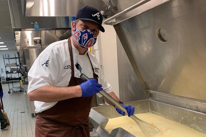 Atlanta Braves Chef Pete Smithing cooking up some cheese sauce at the ballpark.
