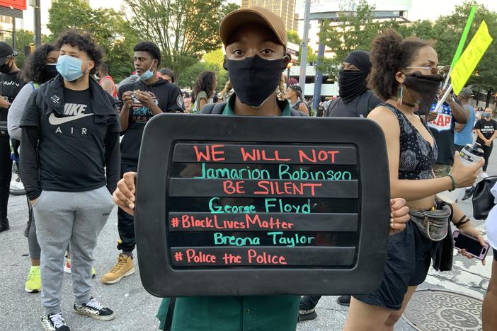 People have been making signs and protesting racial injustice for more than a week after the latest death of a black person by a white police officer.