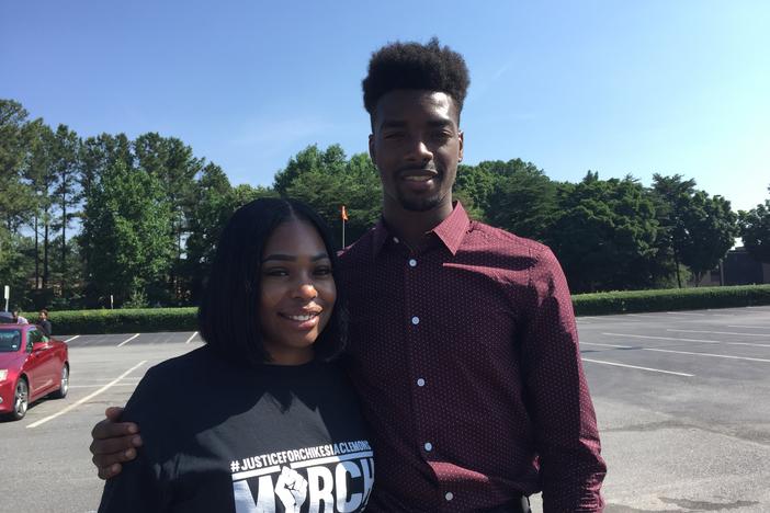 Chikesia Clemons (left) and Anthony Wall before a march for justice Friday June 15, 2018, in Norcross. They are part of a group protesting Waffle House after its employees called police on them in two different instances.