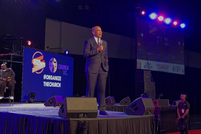 New Jersey Sen. Cory Booker delivers remarks at the Black Church PAC presidential candidate forum held during the Young Leaders Conference in Atlanta on Aug. 16, 2019.