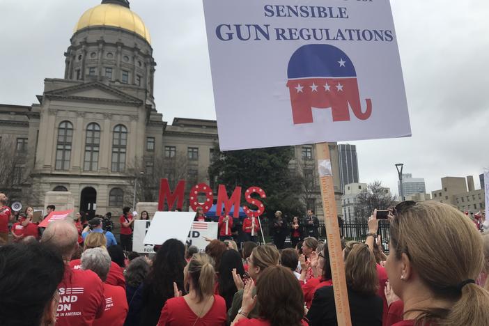 People gather at the Georgia Capitol on Wednesday to advocate for gun safety laws. 