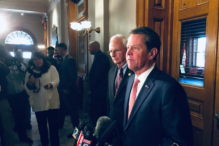 Gov. Brian Kemp and Agriculture Commissioner Gary Black speak to reporters Feb. 27.