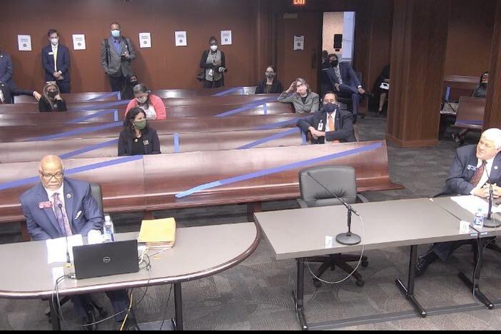 Legislators social distance at a hearing on hate crime legislation in the state House.