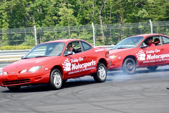 Bobby Ore leads another session at his stunt driving school at Atlanta Motorsports Park in Dawsonville, Georgia.