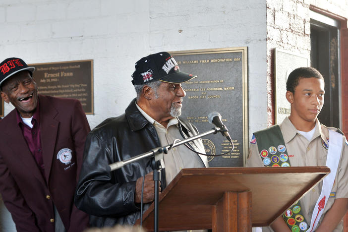 Eagle  scout candidate Gordon Smith, right, is congratulated by two of the Negro League baseball players, Ernest Fann, left, and Robert Scott, center, he helped honor with plaques at Luther Williams Field Saturday in Macon, Ga. 