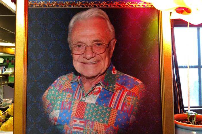 A portrait of Richard Thomas hangs inside R. Thomas Deluxe Grill in Atlanta.