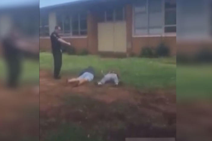 Amateur video of a police officer using his taser in 2015 to break up a fight between two students at Rockdale County High School in Conyers, Georgia.