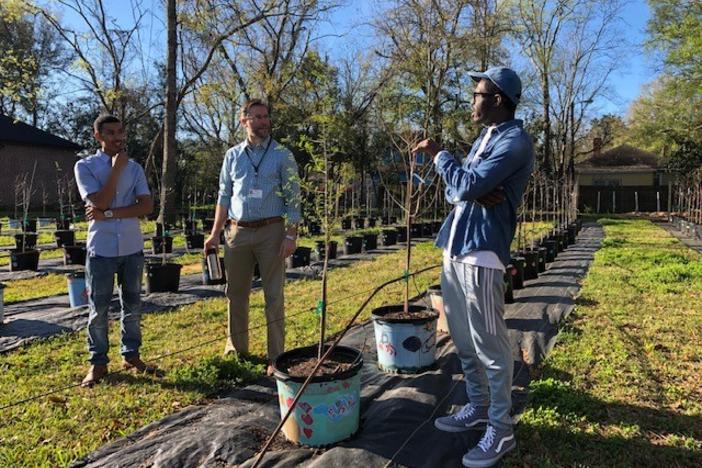 Apprentice arborist Robert Hartwell (L), Savannah Sustainability Director Nick Deffley and apprentice Jason Smith