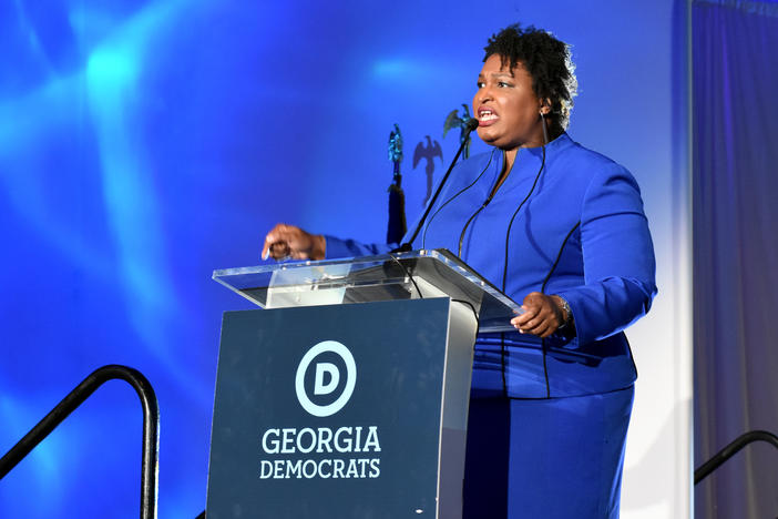 Former gubernatorial nominee and founder of voting rights group Fair Fight Stacey Abrams delivers the keynote address at the Democratic Party of Georgia's annual state dinner.