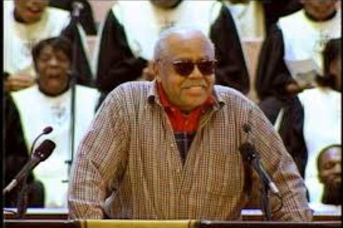 Alley Pat speaking at Civil Rights leader, Hosea Williams' funeral in 2000.