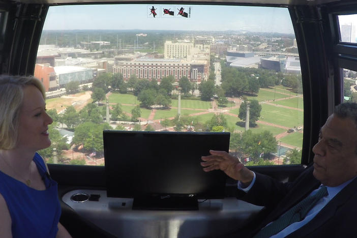 GPB's Rickey Bevington sits down with former Atlanta Mayor and U.S. Ambassador Andrew Young in the SkyView Ferris Wheel.