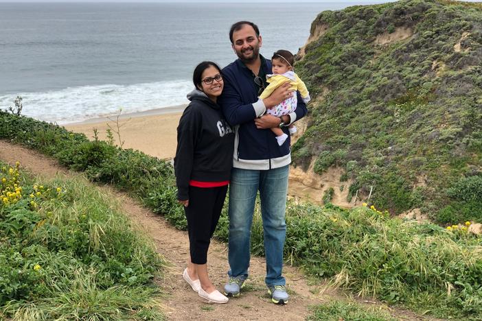 Anitha, Subbu, and their one-year-old daughter, Aadya.