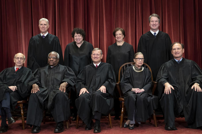 The justices of the U.S. Supreme Court gather for a group portrait.