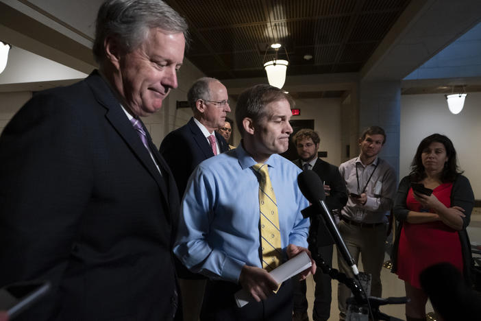 House Republicans, from left, Rep. Mark Meadows, R-North Carolina, Rep. Mike Conaway, R-Texas, and Rep. Jim Jordan, R-Ohio, defend President Donald Trump in the ongoing impeachment inquiry at the Capitol in Washington, Monday, Oct. 28, 2019. 