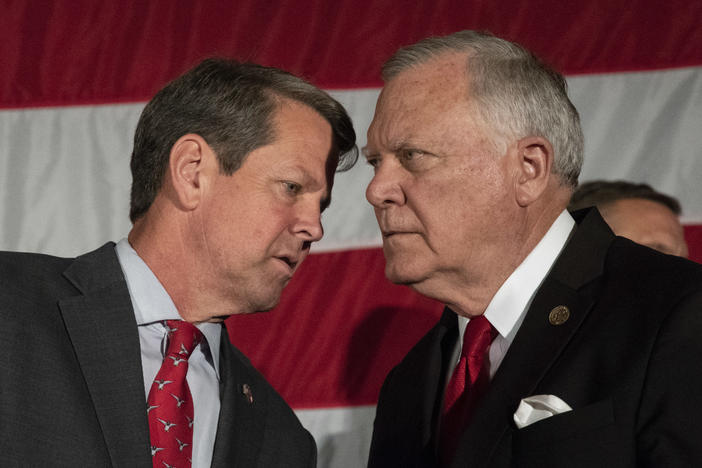 Brian Kemp and Nathan Deal during a campaign rally.