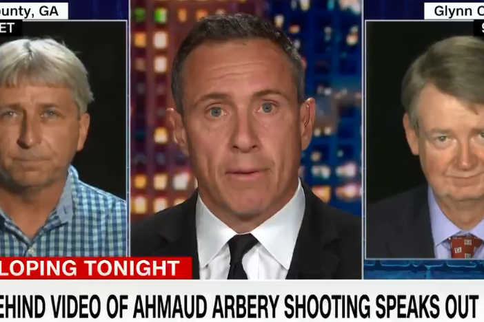 CNN's Chris Cuomo (center) interviews William Bryan (left) and his lawyer, Kevin Gough.