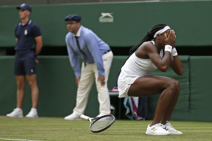 United States' Cori "Coco" Gauff reacts after beating United States's Venus Williams in a Women's singles match during day one of the Wimbledon Tennis Championships in London, Monday, July 1, 2019.