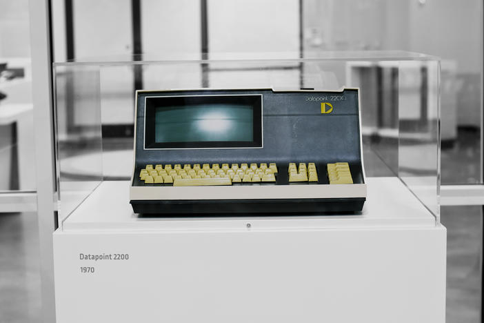 A Datapoint 2200 computer sits in a plexiglass case at the start of a technology timeline in the Computer Museum of America. The new Roswell attraction occupies 44,000 sqaure feet in an old Burlington Coat Factory building in a suburban strip mall.
