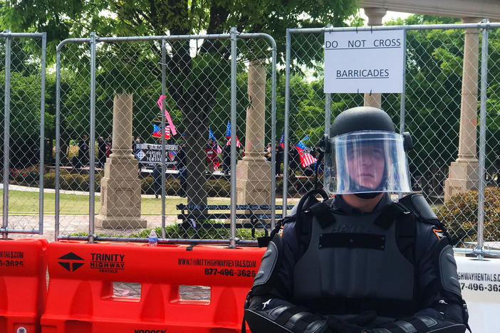 A Georgia State Patrol officer was one of 700 public safety personnel in Newnan on April 21. Law enforcement vastly outnumbered demonstrators. 