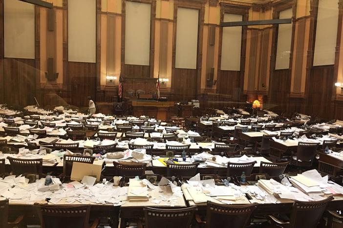 The desks and floor in the the House Chamber were covered in bills tossed by lawmakers after the legislature adjourned Sine Die ending the 2019 legislative session.