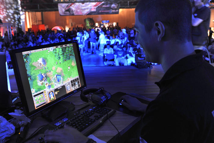 Participant plays a computer game during the 2009 Intel Friday Night Game, a competition of the ESL, Electronic Sports League in Dresden, Germany.