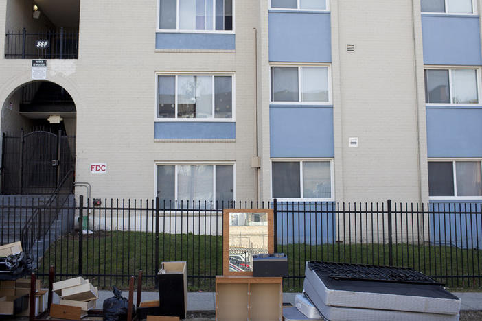 Personal belongings and furniture piled up outside Limes' apartment complex during one of two evictions that took place on March 3, 2016