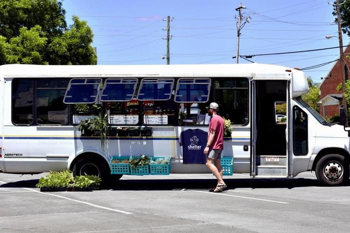 The Farm Bus is parked in a church parking lot that's along a bus line, meaning a lot of foot traffic from people who could purchase food.