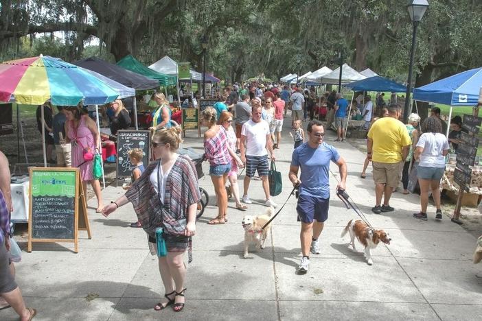 Customers shop at Forsyth Farmers' Market. 