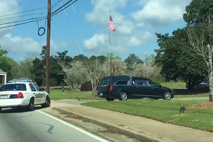 Motorcade pulls into Macon Memorial Park for Bibb-County Deputies Private Funeral 