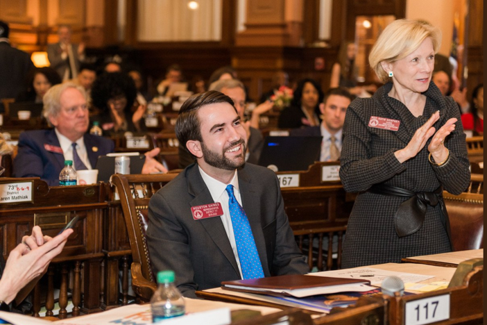 Rep. Houston Gaines and Rep. Katie Dempsey celebrate the passing of HB 217 on Feb. 25.