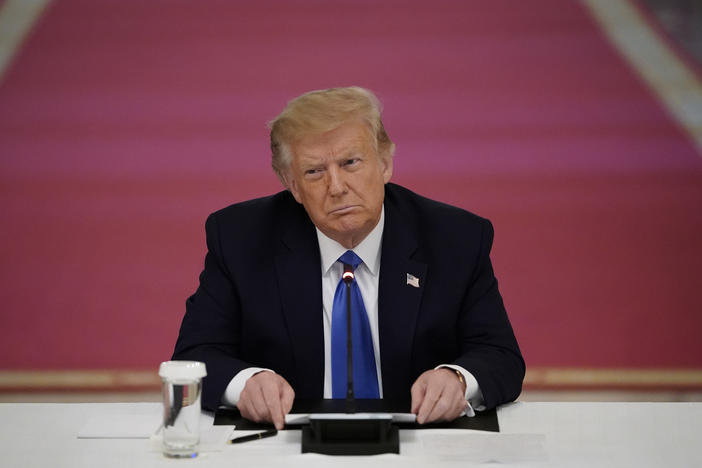 President Trump attends an event about law enforcement on Monday at the White House. Trump has repeatedly downplayed the disproportionate impact of police violence on African Americans.