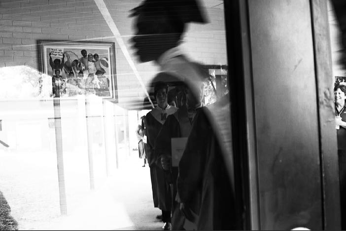 Seniors from Warner Robins' Northside High School walk the halls of Westside Elementary School recently. 