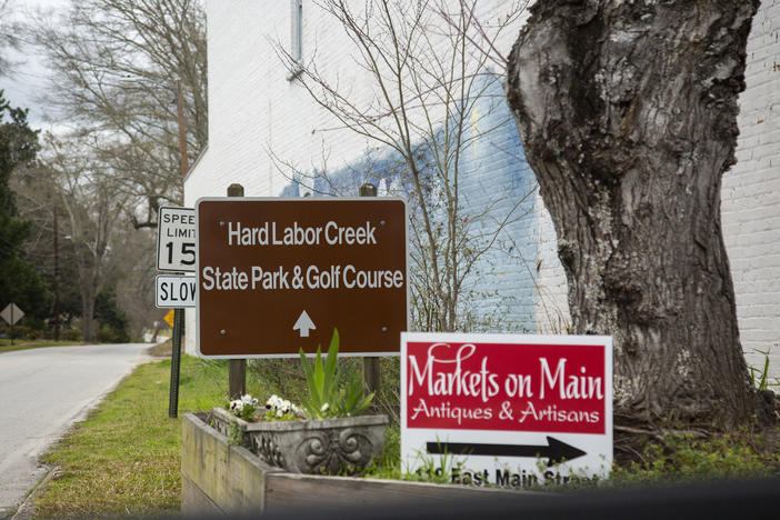 The sign pointing to Hard Labor Creek State Park from downtown Rutledge, about 1/2 mile away from the isolation site for COVID-19 patients.