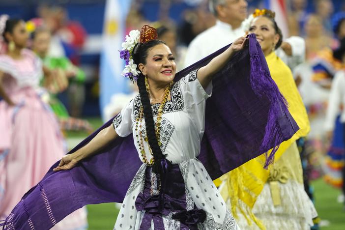 Dancers perform to celebrate Hispanic Heritage Month during halftime of an NFL football game between the Oakland Raiders and the Indianapolis Colts in Indianapolis, Sunday, Sept. 29, 2019.