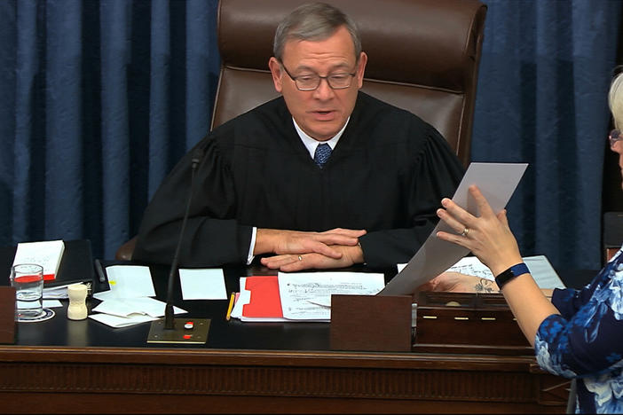 In this image from video, presiding officer Supreme Court Chief Justice John Roberts reads the results of an amendment offered by Senate Minority Leader Chuck Schumer, D-N.Y., during the impeachment trial against President Donald Trump in the Senate.