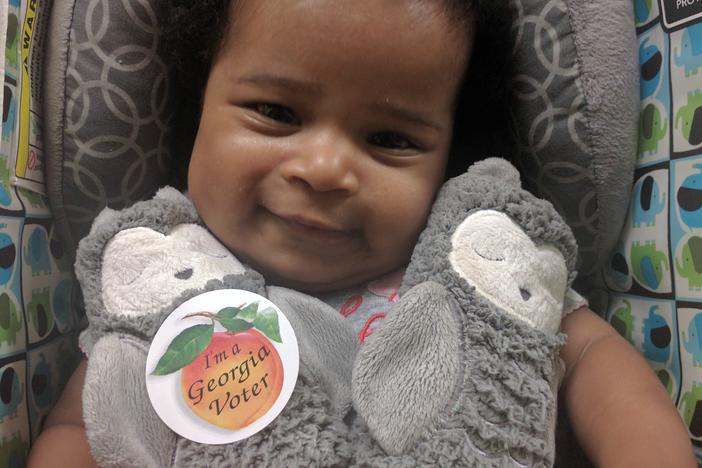 Even babies get in on the voting sticker action on Election Day.