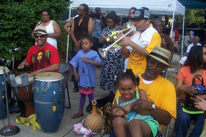 Musicians and attendees interact at a previous Juneteenth Freedom Festival in Macon. This year is the festival's 27th year, and it takes place Saturday in Tattnall Square Park.